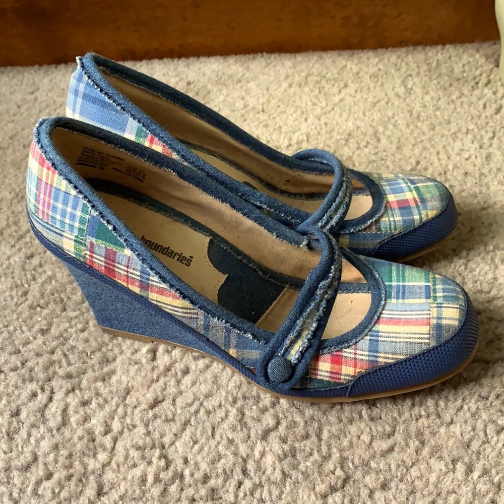 No Boundaries plaid wedged heels.